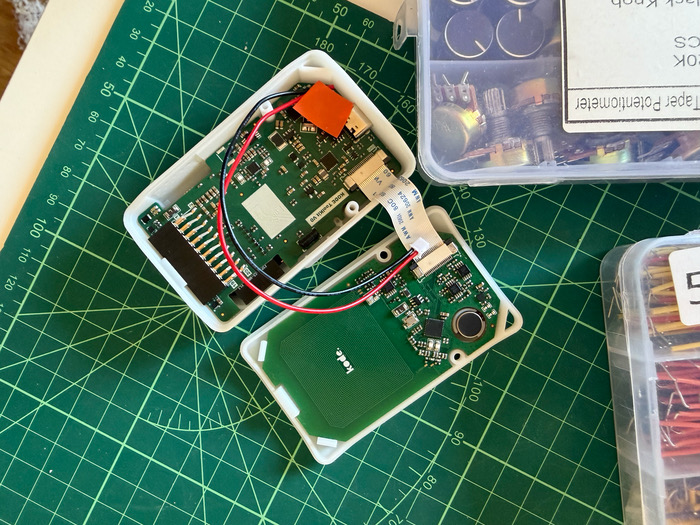 The Kode Dot main PCB and antenna PCB sitting in their enclosure halves